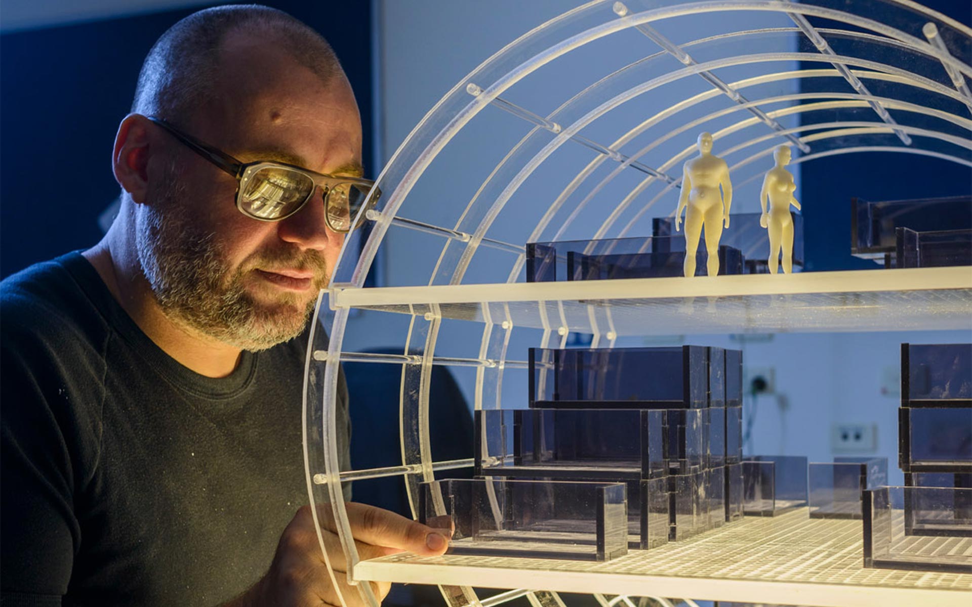 Engineer working with a plastic scale model