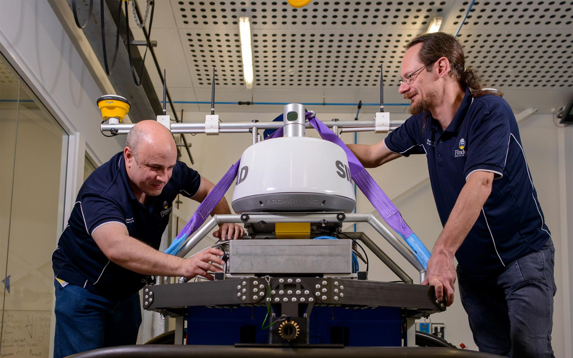 Flinders personell working on a USV