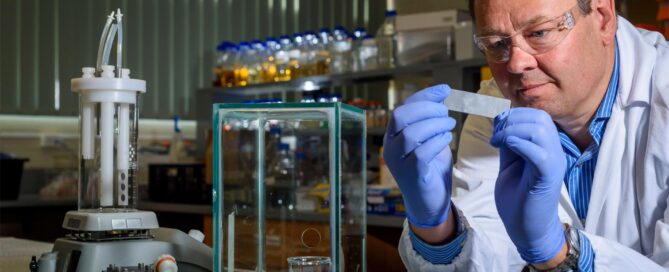 Scientist working to develop an active marine coating