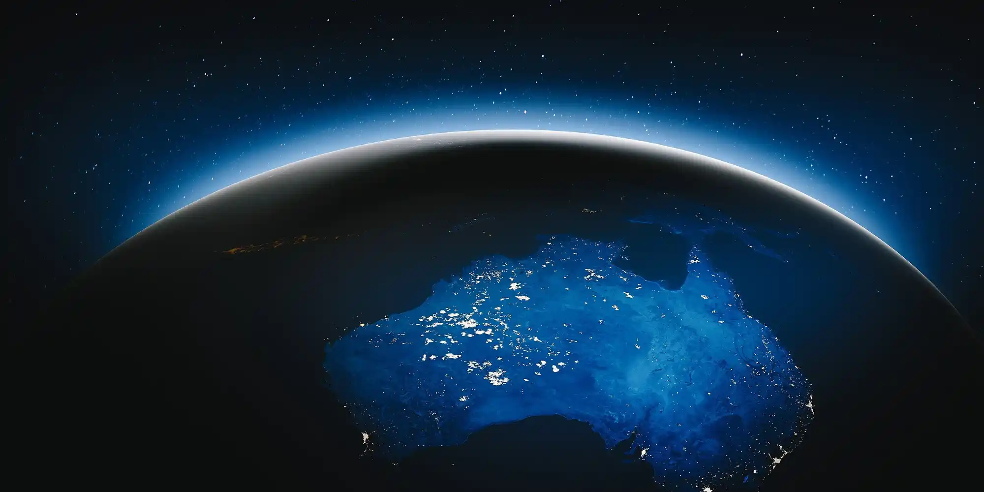 A graphic of Earth, highlighting Australia, featuring a glow behind the globe.
