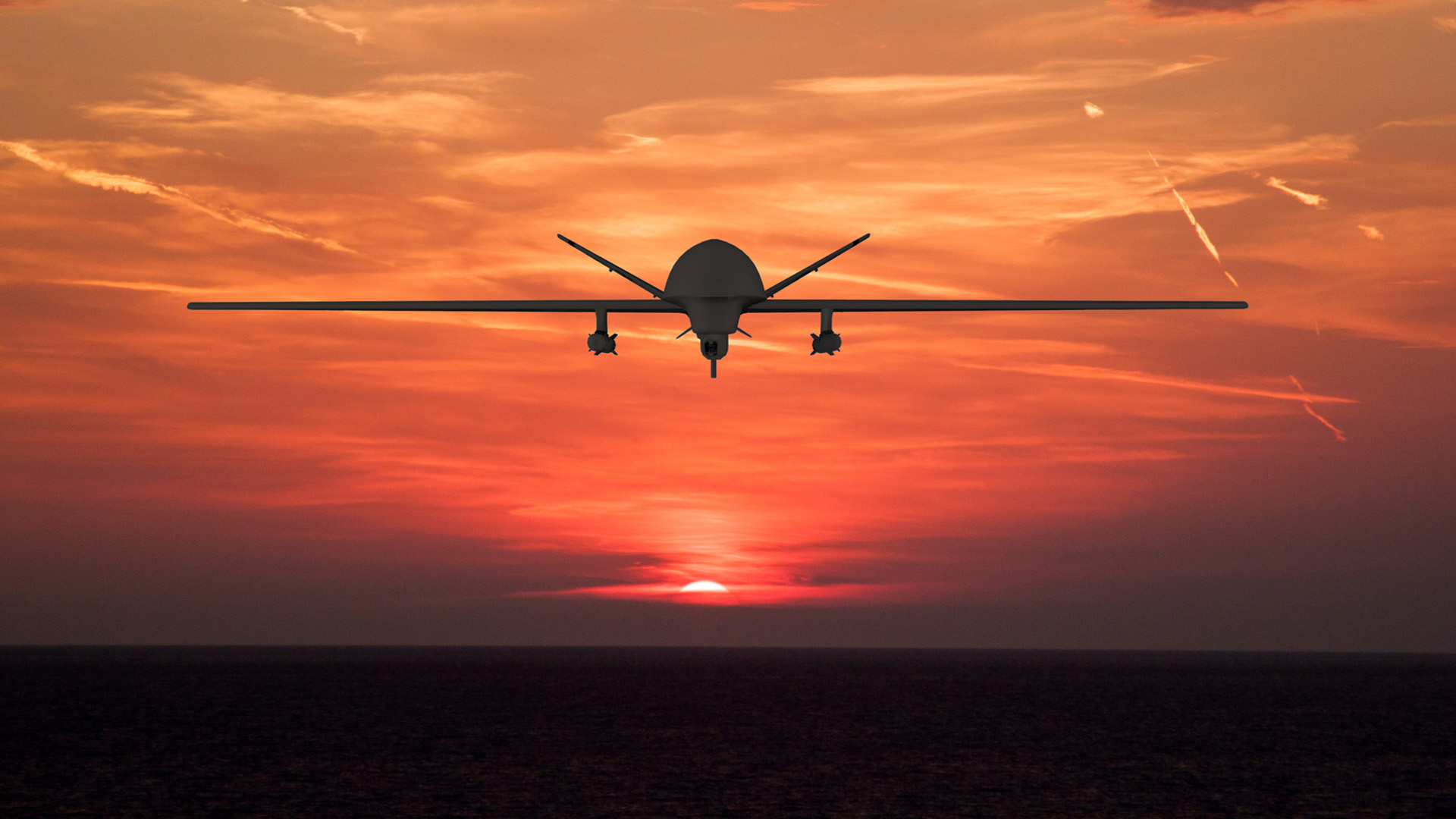Defence drone in the air at sunset