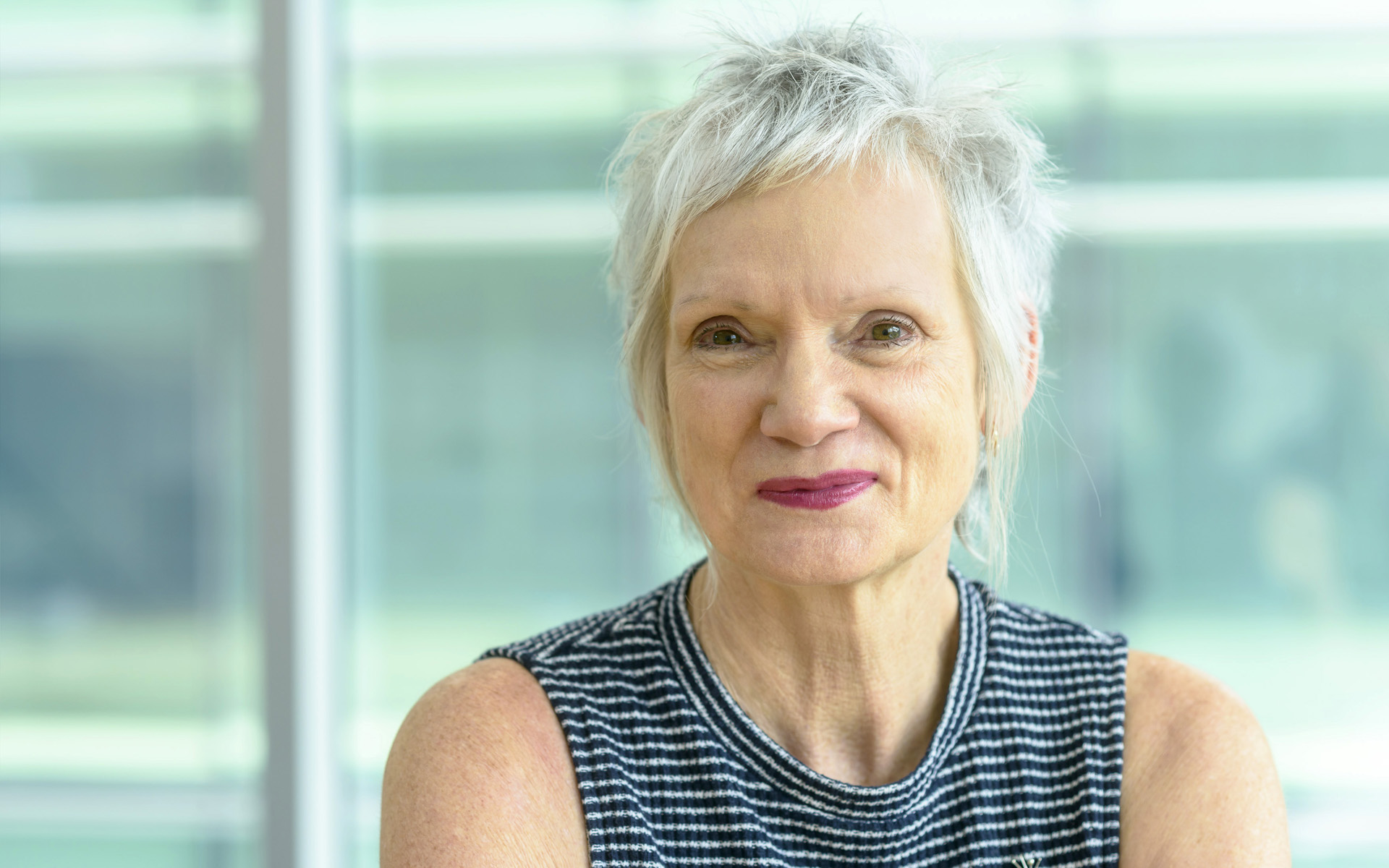 Professional woman posing for a corporate style headshot