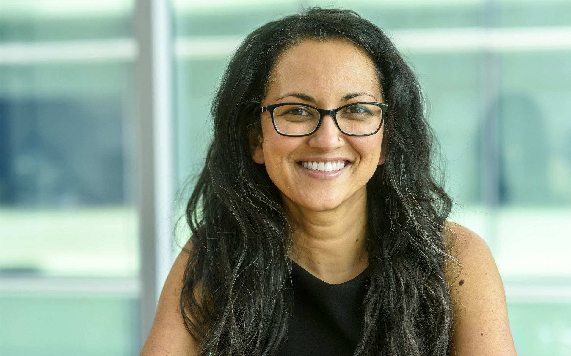 Professional woman posing for a corporate headshot