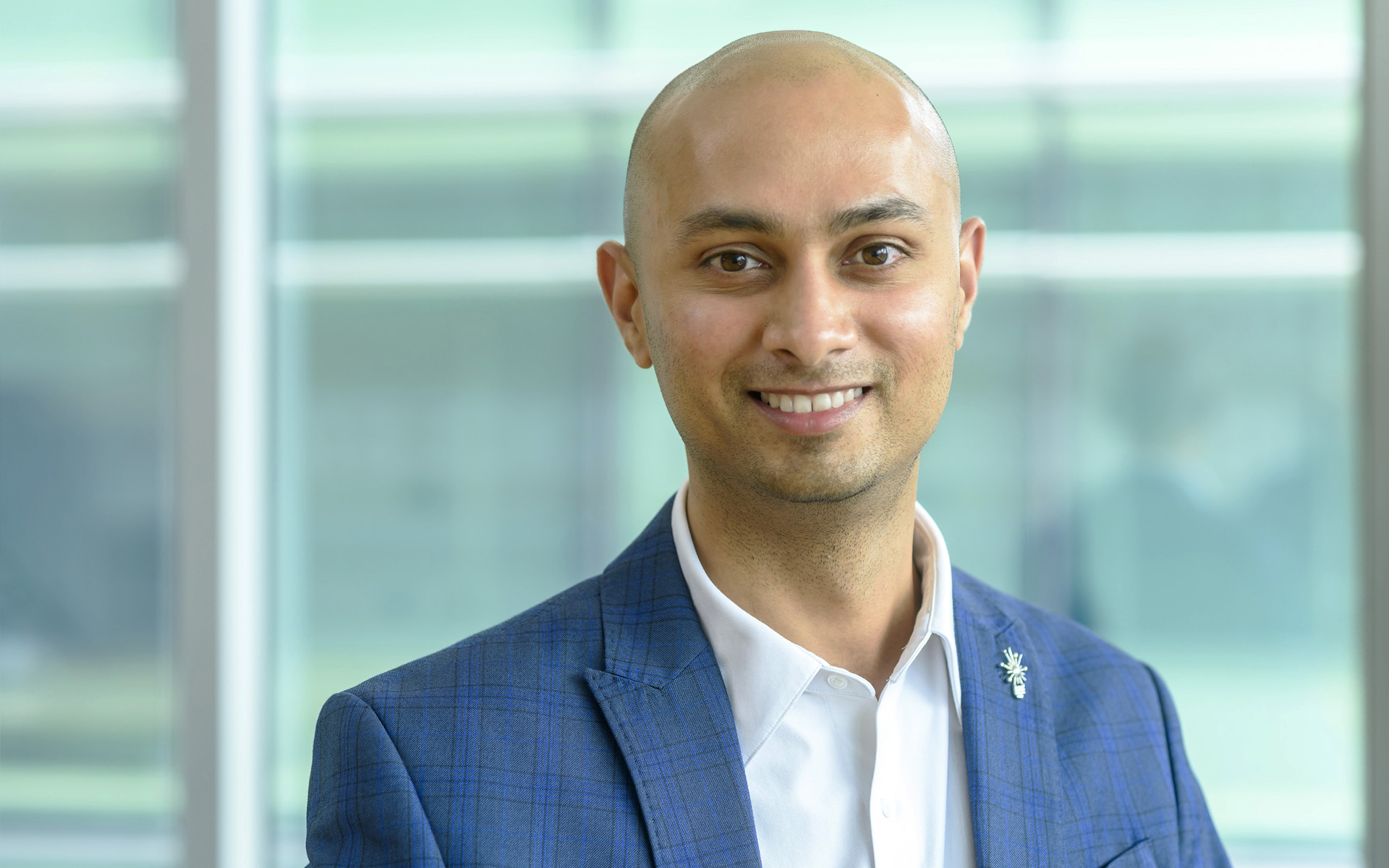 Professional man posing for a corporate style headshot